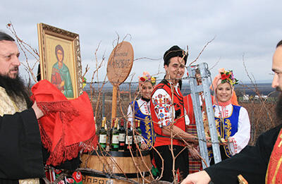 A silver cross blessed the "Karnobat grape brandy" on the day of Trifon Zarezan